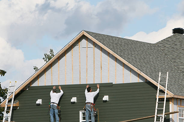 Professional Siding Contractor technician working in Dundee, OH